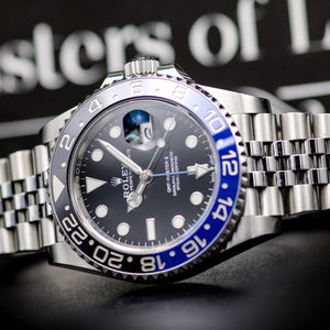 Shop the Rolex 126710BLNR 'Batgirl' - 2021 model with black and blue bezel. Excellent condition. Stainless steel case and Jubilee bracelet. Water resistant. Powered by automatic movement. Box & papers included. Contact Wristers of London in Essex for pricing and availability.